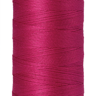 Fuschia Mettler silk finish egyptian cotton 50WT (547 yd) thread spool. 9104-1421 alternate: 10450-0960