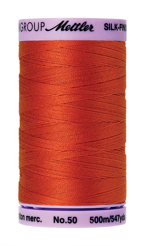 Paprika Mettler silk finish egyptian cotton 50WT (547 yd) thread spool. 9104-0450 alternate: 10450-0594