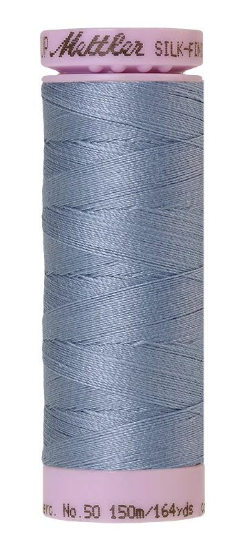 Smoky Blue Mettler silk finish egyptian cotton 50WT (164 yd) thread spool. 9105-0351 alternate: 10550-0789