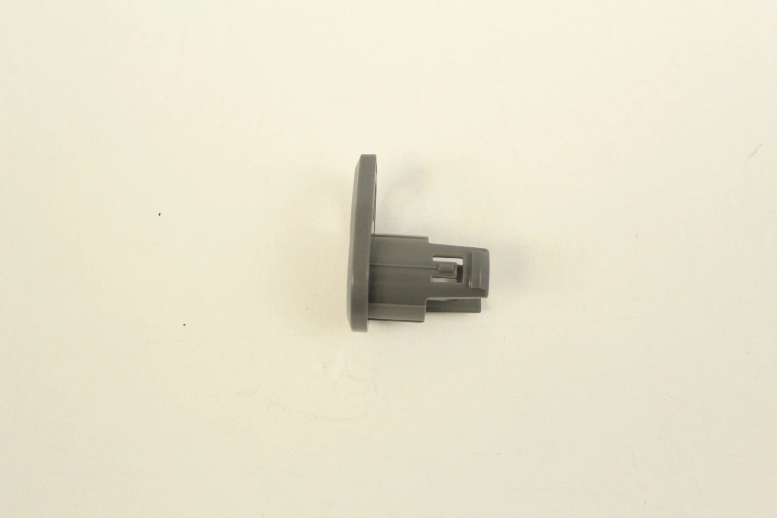 Cord Wrap Knob Med Cool Grey Bissell repair part number: 1610507 - Image 2