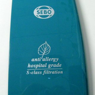 Attachment Cover, for C1.1 (teal green) Sebo vacuum cleaner repair part