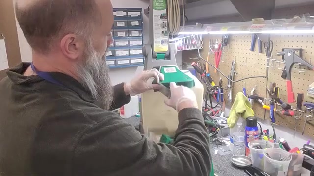 Locate the inlet on the bottom of the dirty water tank where water enters.
