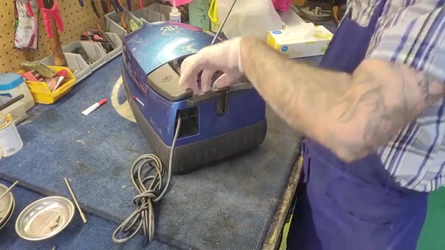 Remove the dust bag from the canister.