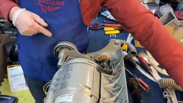 Remove the three T15 screws holding the motor shroud.