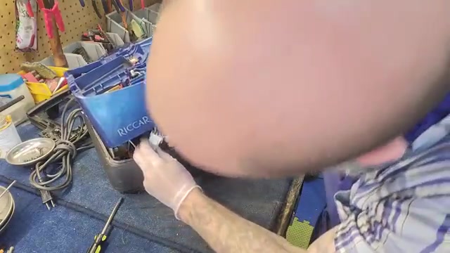 Carefully lift the top housing.