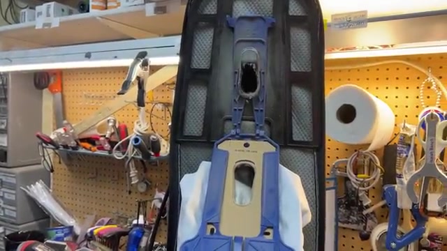 Remove the bag from the vacuum.