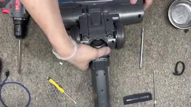 Replace the bottom cover, ensuring proper alignment.