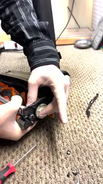 Spin the brush roll manually several times to ensure the belt is fully seated.