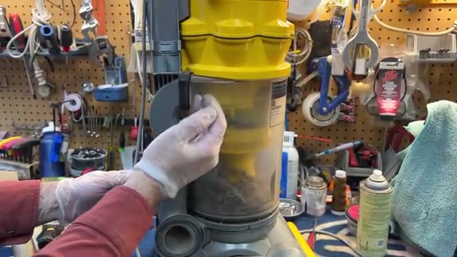 Remove the canister from the machine.