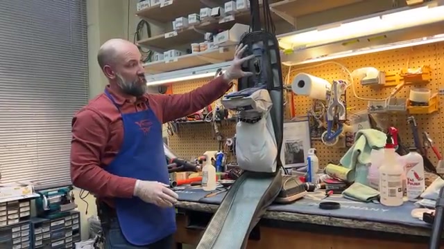 Use tweezers to pick out visible debris from the bag connection area.