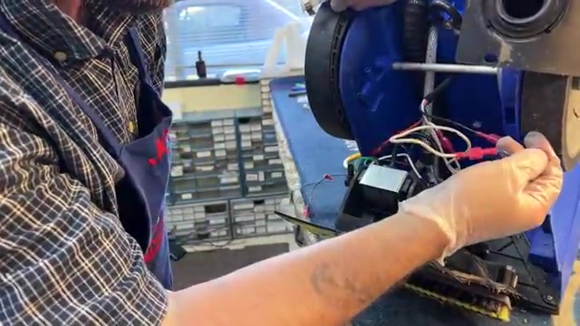 Insert the new pump into the rubber mounting bracket.