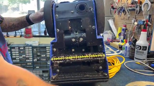 Reinstall both plastic bottom covers with all screws (remember the one without a washer goes in its special location).