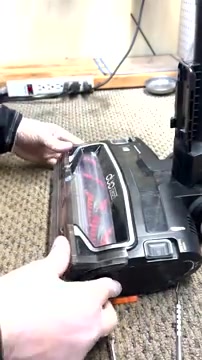 Plug in the vacuum and turn it on.