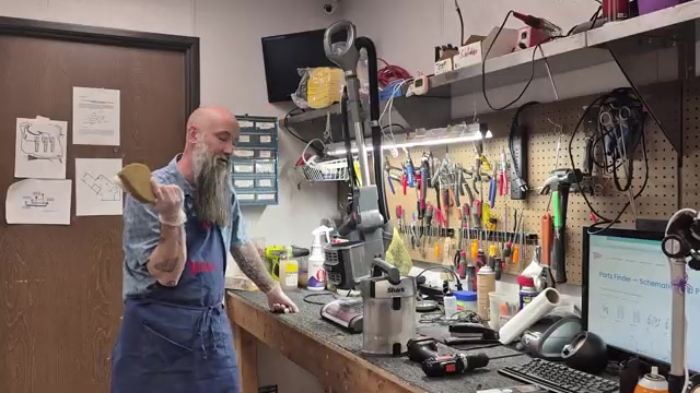 Remove the dirt canister from the vacuum body.